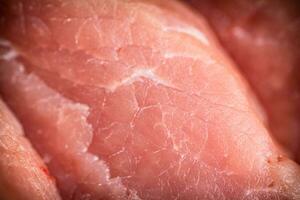 Raw pork. Macro background. The texture of the meat. photo