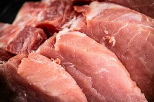 Raw pork. Macro background. The texture of the meat. photo