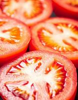 A round piece of tomato. Macro background. photo