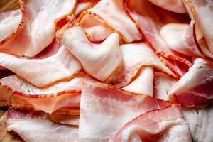 Strips of bacon. Macro background. photo