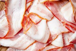 Strips of bacon. Macro background. photo