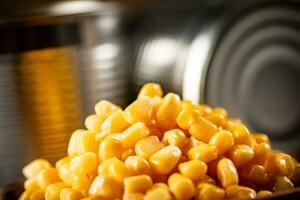 A pile of canned corn. photo