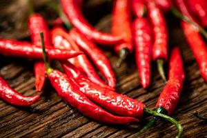 Chili peppers on the table. photo