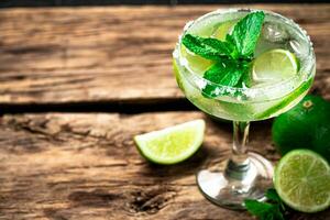 Margarita with pieces of lime. photo