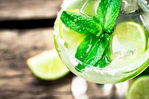 Margarita with pieces of lime. photo