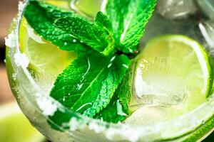 Margarita with mint, lime and ice. photo