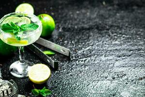 Margarita with mint and lime leaves. photo