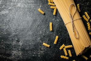 A bunch of spaghetti dry on the table. photo