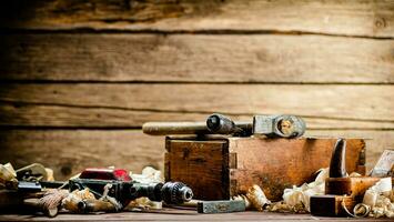 Various working tools on wood on the table. photo