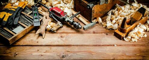 Various working tools on wood on the table. photo