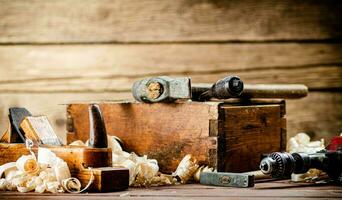 Various working tools on wood on the table. photo