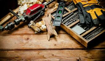 Various working tools on wood on the table. photo