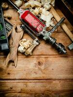 Various working tools on wood on the table. photo