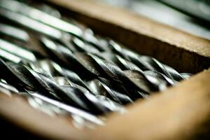 Various drill bits for drills. photo