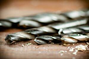 Various drill bits for drills. photo