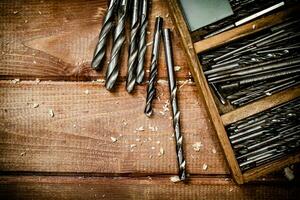 Various drill bits for drills. photo