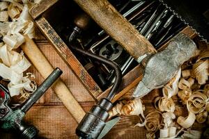 Various working tools on wood on the table. photo