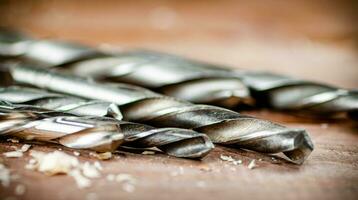 Various drill bits for drills. photo