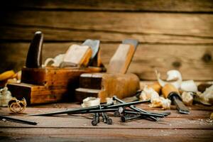 Construction nails on the table. photo