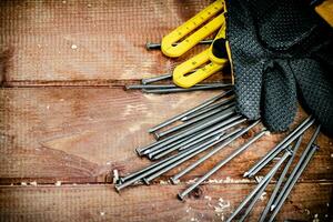 A pile of bolts. Macro background. photo