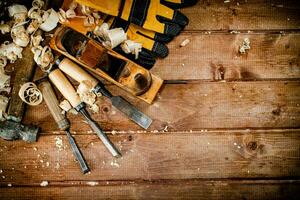 Working tool on wood with sawdust. photo