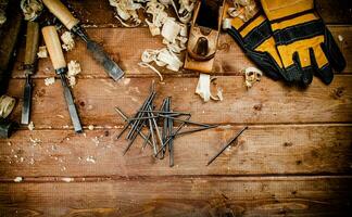 Construction nails on the table. photo