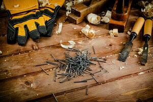 Construction nails on the table. photo