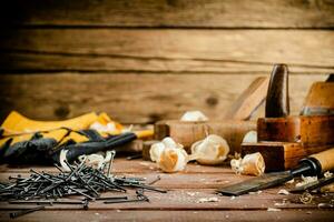 A pile of nails on the table. photo