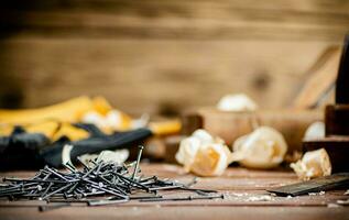 A pile of nails on the table. photo