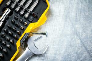 A set of bits with wrenches. photo