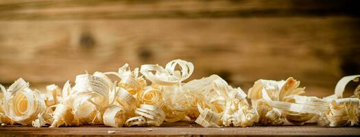 Wooden shavings on the table. photo