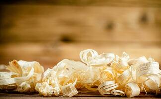 Wooden shavings on the table. photo