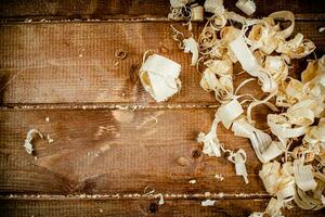 Wooden shavings on the table. photo