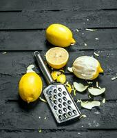 Fresh lemon zest with grater. photo