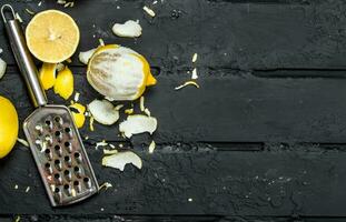 Fresh lemon zest with grater. photo