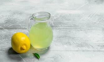 Lemon juice in the pitcher. photo