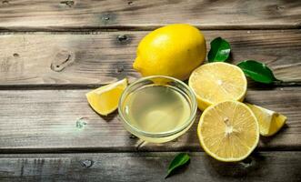 Lemon juice in the bowl. photo
