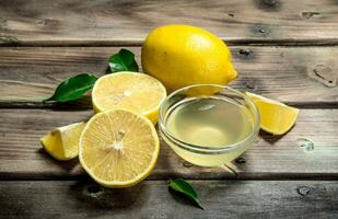 Lemon juice in the bowl. photo