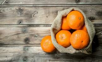 Fresh mandarins in the sack. photo