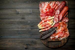 Antipasto background.A variety of meat snacks. photo