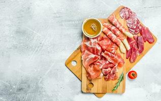 Antipasto background.The various meats. photo