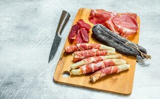 Antipasto background.The various meats. photo