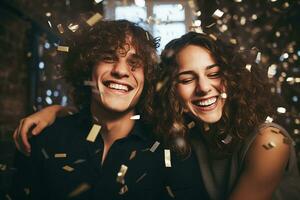 Young couple having fun on  New Years party. photo