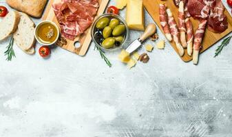 Antipasto background. Variety of Italian snacks. photo