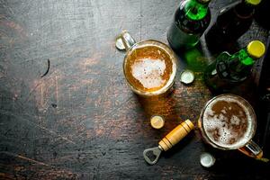 Beer in bottles and glasses. photo