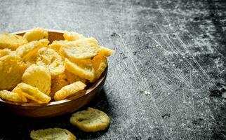 Crumbs of white bread in a bowl. photo