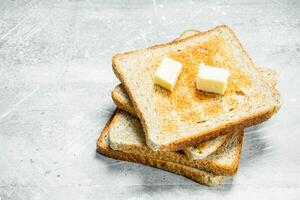 Breakfast. Toasted bread and butter. photo