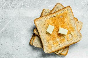 Breakfast. Toasted bread and butter. photo