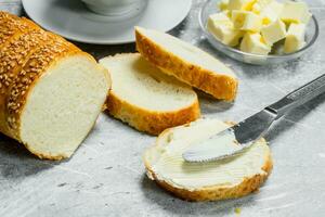 Breakfast. Bread with butter and hot coffee. photo