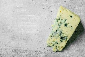 Piece of blue cheese. photo